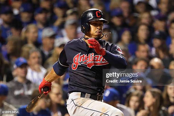 Francisco Lindor of the Cleveland Indians hits a single in the fourth inning against the Chicago Cubs in Game Three of the 2016 World Series at...