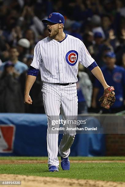 Justin Grimm of the Chicago Cubs reacts in the fifth inning against the Cleveland Indians in Game Three of the 2016 World Series at Wrigley Field on...