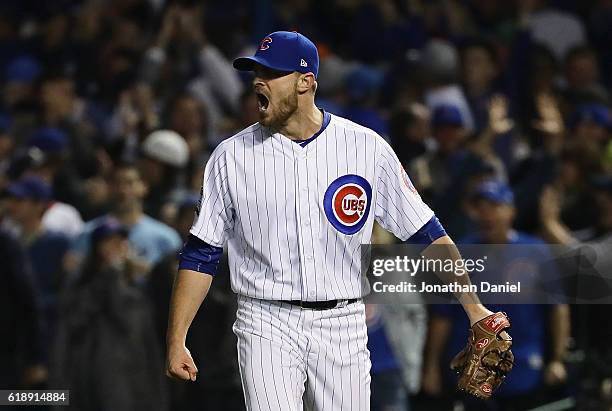 Justin Grimm of the Chicago Cubs reacts in the fifth inning against the Cleveland Indians in Game Three of the 2016 World Series at Wrigley Field on...