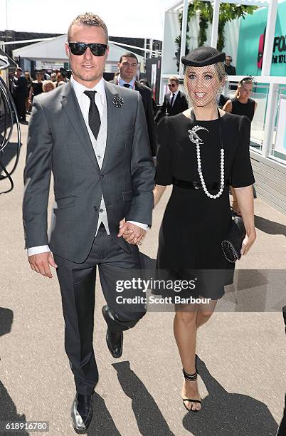 Bec and Lleyton Hewitt arrive at the Lavazza Marquee on Derby Day at Flemington Racecourse on October 29, 2016 in Melbourne, Australia.