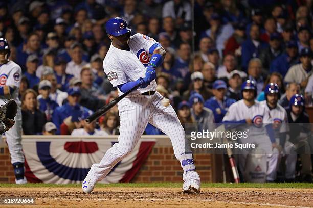 Jorge Soler of the Chicago Cubs hits a triple in the seventh inning against the Cleveland Indians in Game Three of the 2016 World Series at Wrigley...