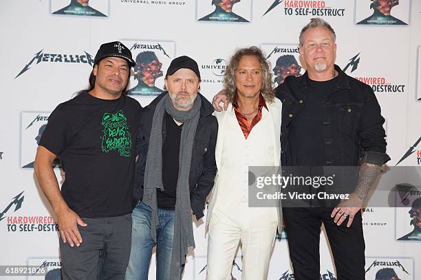 Musicians Robert Trujillo, Lars Ulrich, Kirk Hammett and James Hetfield of Metallica attend a promotial event for Metallica's new album "Hardwired to...