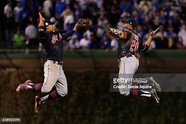 Francisco Lindor and Rajai Davis of the Cleveland Indians celebrate after defeating the Chicago Cubs 1-0 in Game Three of the 2016 World Series at...