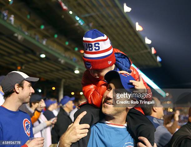 Cubs fans are seen during Game 3 of the 2016 World Series between the Cleveland Indians and the Chicago Cubs at Wrigley Field on Friday, October 28,...