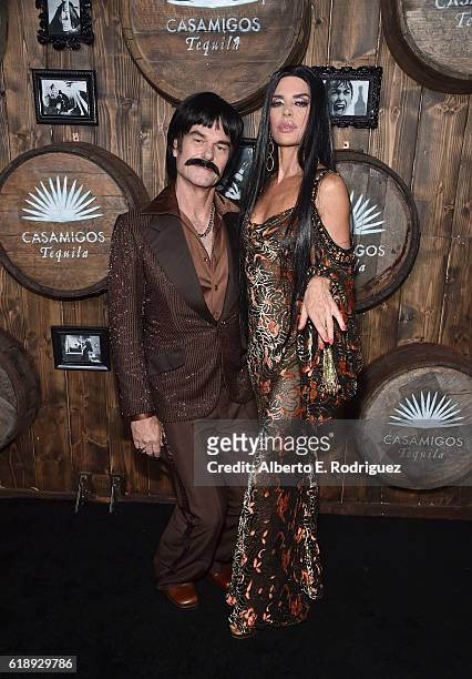 Actors Harry Hamlin and Lisa Rinna arrive to the Casamigos Halloween Party at a private residence on October 28, 2016 in Beverly Hills, California.