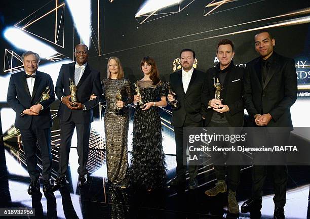 Honorees Ang Lee , Samuel L. Jackson , Jodie Foster , Felicity Jones , Ricky Gervais and Ewan McGregor and host Ben 'Doc Brown' Smith pose onstage...