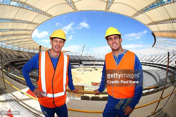 Australian cricket players Adam Voges and Mitchell Marsh pose during the new Perth Stadium Tour on October 29, 2016 in Perth, Australia.