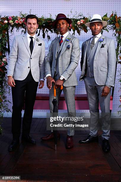 Myer Fashions on the Field Men's Racewear competition winner Shayne Tino and Runners Up Chico Seaton Trotman and Alexander Jordan pose in the Myer...