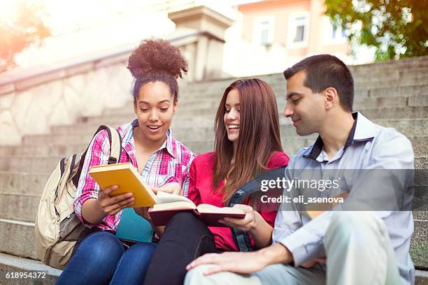 students outdoor with books - read book outside young woman bildbanksfoton och bilder