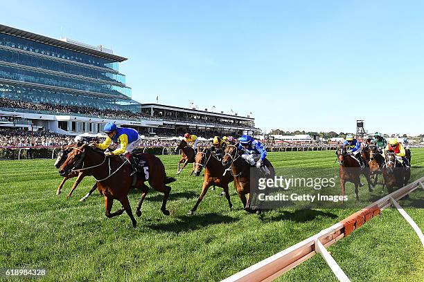 Hugh Bowman rides Le Romain to win race eight, the Cantala Stakes on Derby Day at Flemington Racecourse on October 29, 2016 in Melbourne, Australia.