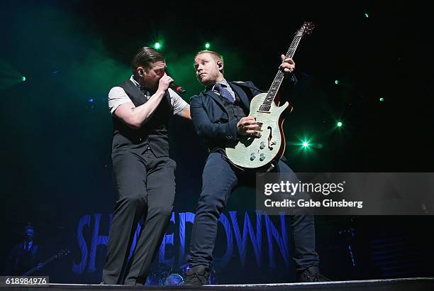 Singer Brent Smith and guitarist Zach Myers of Shinedown perform at T-Mobile Arena on October 28, 2016 in Las Vegas, Nevada.