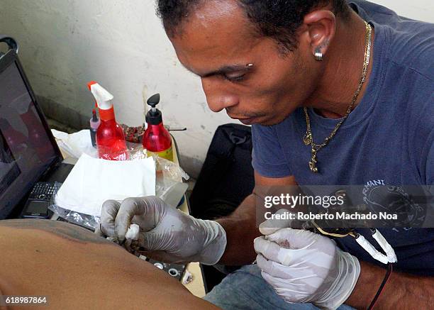 Open air tattoo fair in the Culture House porch. Tattoo artists try... News Photo - Getty Images Open air tattoo fair in the Culture House porch. Tattoo artists try... News Photo - Getty Images