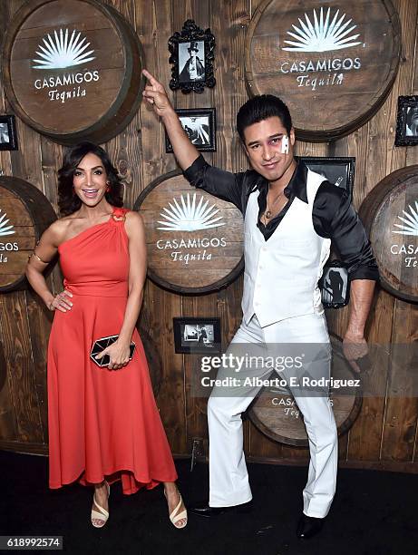 Courtney Mazza and Mario Lopez arrive to the Casamigos Halloween Party at a private residence on October 28, 2016 in Beverly Hills, California.