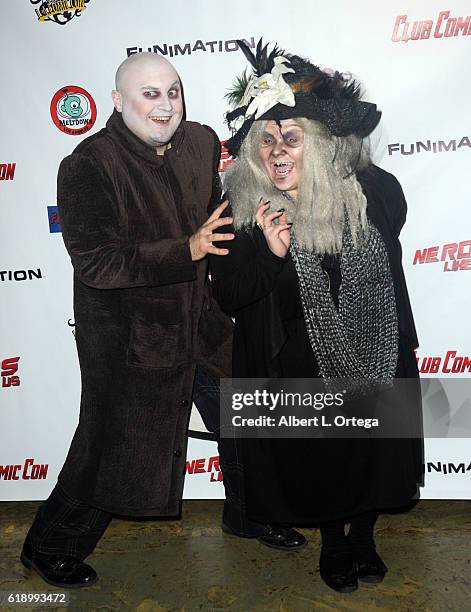 Chad Edward Lee Evett as Uncle Fester and Rhapsody Artajo as Grandma Addams attend Club Comic Con Launch Party held at Globe Theatre on October 28,...