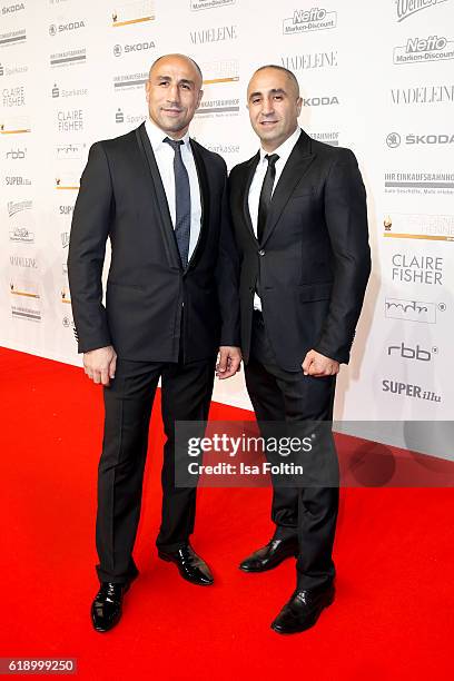 Boxer Arthur Abraham and his brother Alexander Abraham attend the Goldene Henne on October 28, 2016 in Leipzig, Germany.