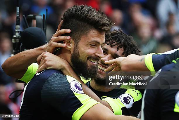 Oliver Giroud of Arsenal celebrates after he scores his second goal during the Premier League match between Sunderland and Arsenal at Stadium of...
