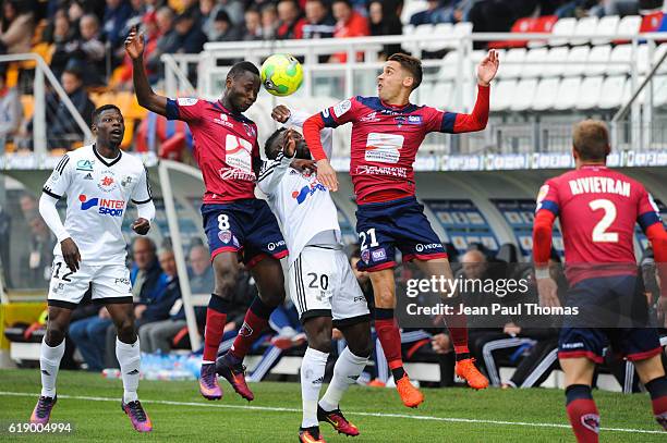 Joseph Romeric LOPY of Clermont Richard SOUMAH of Amiens and Remy DUGIMONT of Clermont during the French Ligue 2 between Clermont and Amiens at Stade...