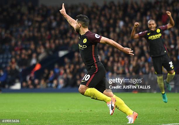 Manchester City's Argentinian striker Sergio Aguero celebrates after scoring their second goal during the English Premier League football match...