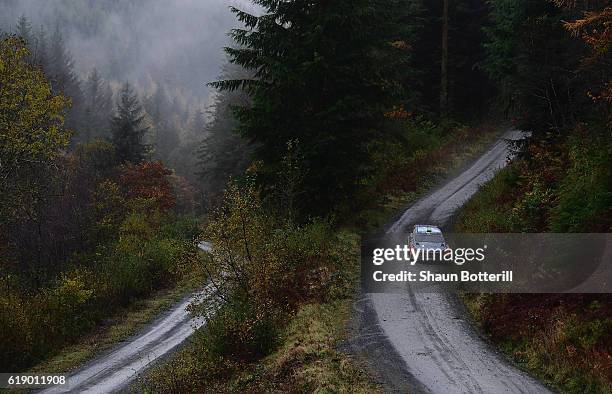 Hayden Paddon and co driver John Kennard of New Zealand and Hyundai Motorsport N during the FIA World Rally Championship Great Britain Dyfi stage on...