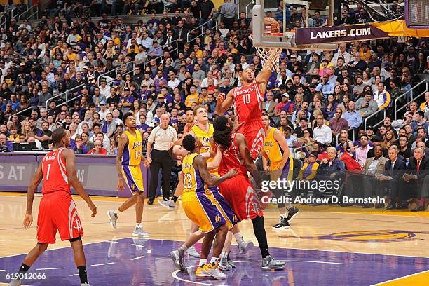 Eric Gordon of the Houston Rockets drives to the basket against the Los Angeles Lakers on October 26, 2016 at STAPLES Center in Los Angeles,...