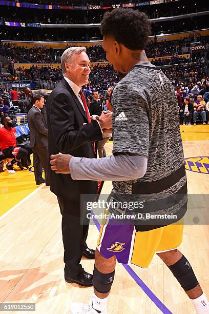 Mike D'Antoni of the Houston Rockets shakes hands with Nick Young of the Los Angeles Lakers before the game on October 26, 2016 at STAPLES Center in...