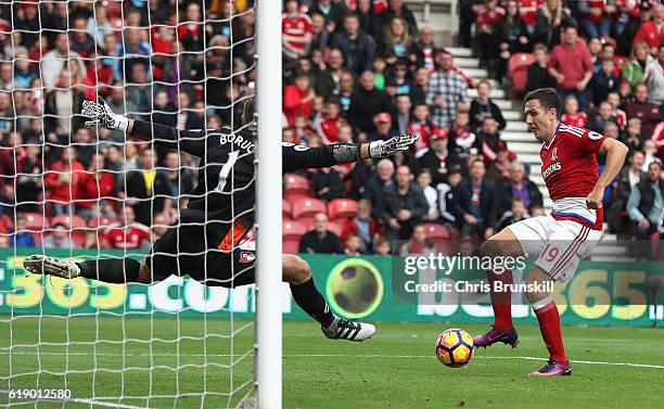 Stewart Downing of Middlesbrough scores his sides second goal past Artur Boruc of AFC Bournemouth during the Premier League match between...