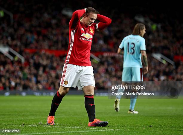 Wayne Rooney of Manchester United reacts during the Premier League match between Manchester United and Burnley at Old Trafford on October 29, 2016 in...