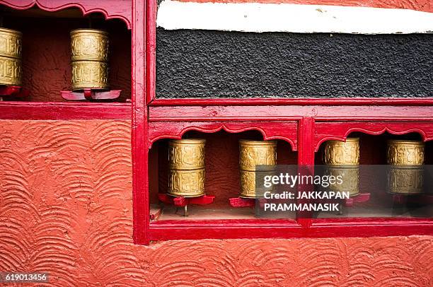 prayer wheels in thiksay monastery - thiksey monastery stock pictures, royalty-free photos & images