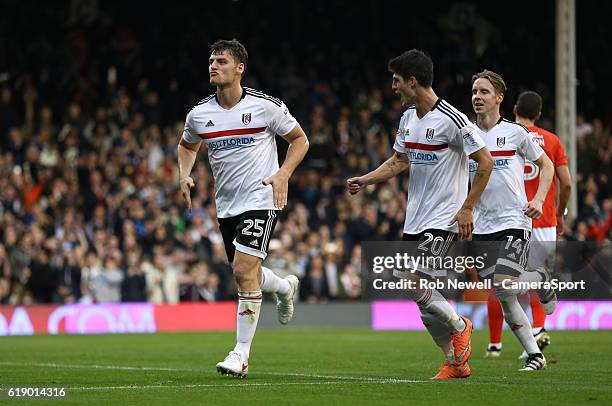 Fulham's Chris Martin celebrates scoring his sides fourth goal during the Sky Bet Championship match between Fulham and Huddersfield Town at Craven...