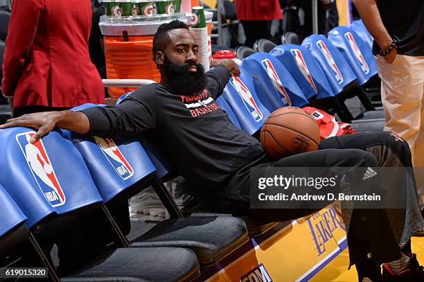 James Harden of the Houston Rockets sits on the bench before the game against the Los Angeles Lakers on October 26, 2016 at STAPLES Center in Los...