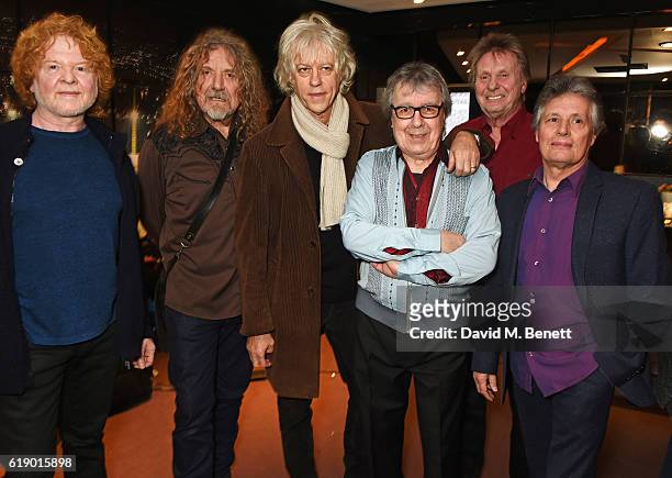 Mick Hucknall, Robert Plant, Sir Bob Geldof, Bill Wyman, Joe Brown and Terry Taylor pose backstage at Bill Wyman's 80th Birthday Gala as part of...