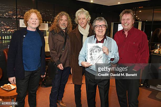 Mick Hucknall, Robert Plant, Sir Bob Geldof, Bill Wyman and Joe Brown pose backstage at Bill Wyman's 80th Birthday Gala as part of BluesFest London...