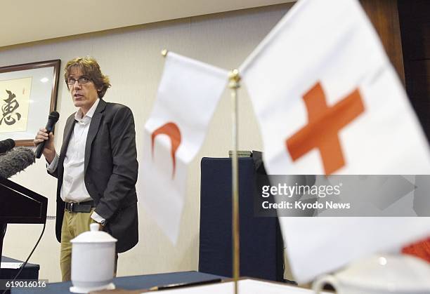 Patrick Fuller, an official of the International Federation of Red Cross and Red Crescent Societies, attends a press conference in Beijing on Oct. 29...