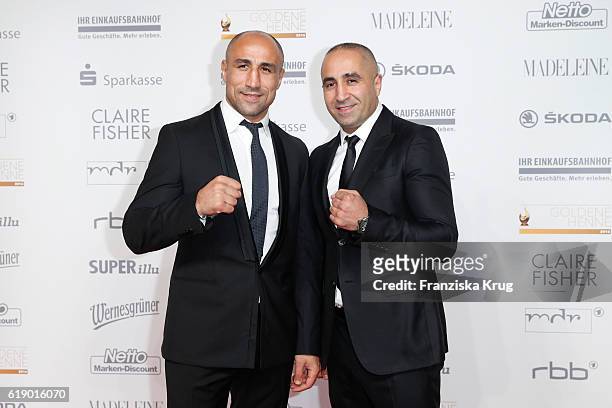 Boxer Arthur Abraham and his brother Alexander Abraham attend the Goldene Henne on October 28, 2016 in Leipzig, Germany.