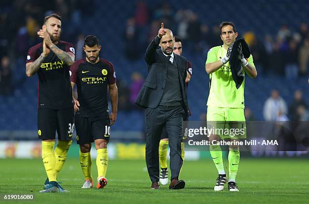 Josep Guardiola the manager of Manchester City points to the fans as the team applaud after the Premier League match between West Bromwich Albion and...