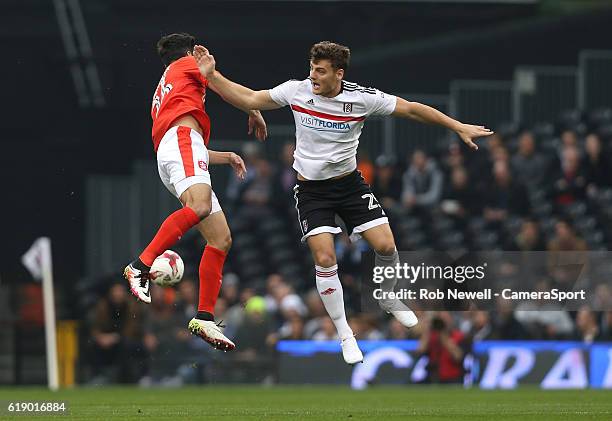 Fulham's Chris Martin and Huddersfield Town's Christopher Schindler during the Sky Bet Championship match between Fulham and Huddersfield Town at...