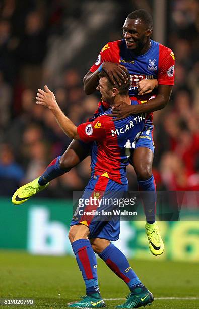 James McArthur of Crystal Palace celebrates scoring his team's first goal with his team mate Christian Benteke during the Premier League match...
