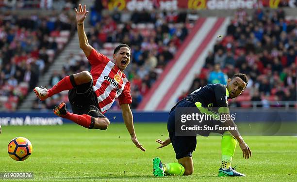 Steven Pienaar of Sunderland is fouled by Francis Coquelin of Arsenal during the Premier League match between Sunderland and Arsenal at the Stadium...