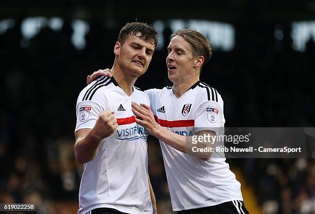 Fulham's Chris Martin celebrates scoring his sides fourth goal with Stefan Johansen during the Sky Bet Championship match between Fulham and...