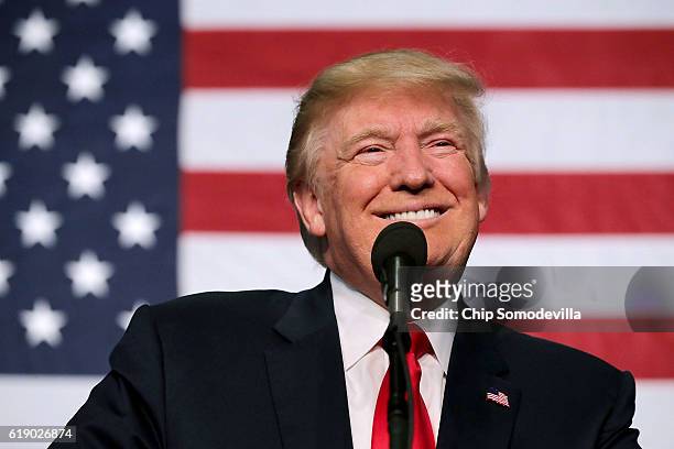 Republican presidential nominee Donald Trump addresses a campaign rally in the Rodeo Arena at the Jefferson County Fairgrounds October 29, 2016 in...