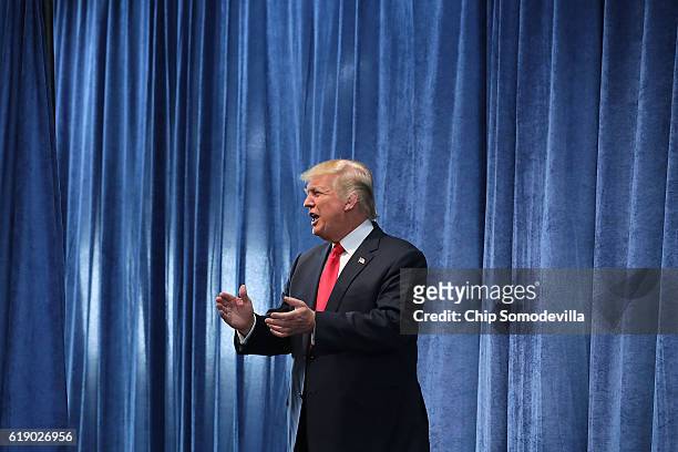 Republican presidential nominee Donald Trump arrives for a campaign rally in the Rodeo Arena at the Jefferson County Fairgrounds October 29, 2016 in...