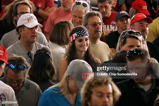 Supporters wait for Republican presidential nominee Donald Trump before a campaign rally in the Rodeo Arena at the Jefferson County Fairgrounds...