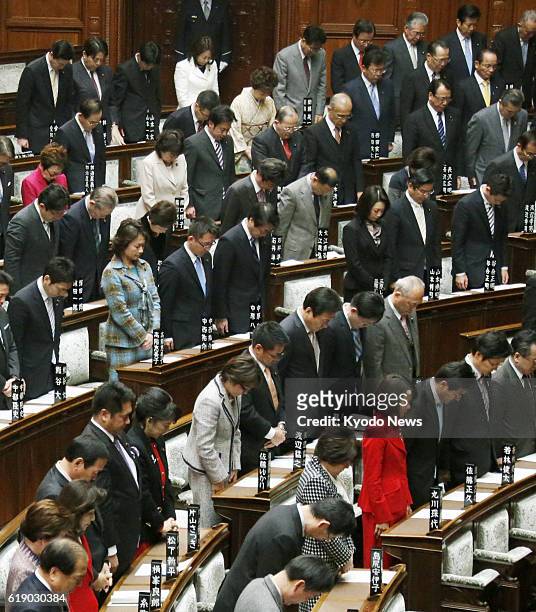 Japan - Lawmakers observe a moment of silence to pay tribute to the victims of a hostage crisis in Algeria at the main hall of the House of...