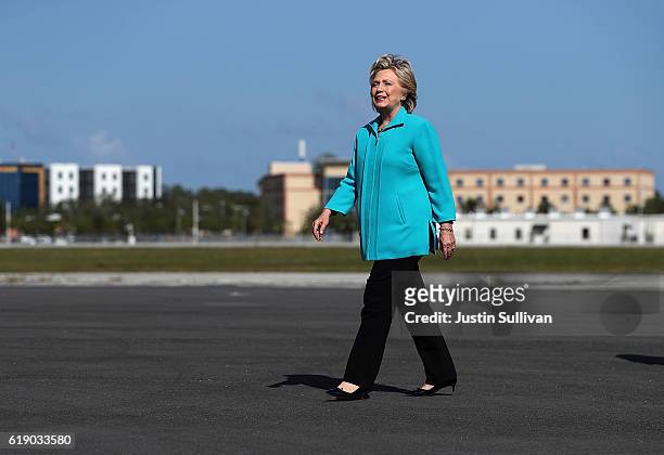 Democratic presidential nominee former Secretary of State Hillary Clinton arrives at Daytona Beach Airport on October 29, 2016 in Daytona Beach,...