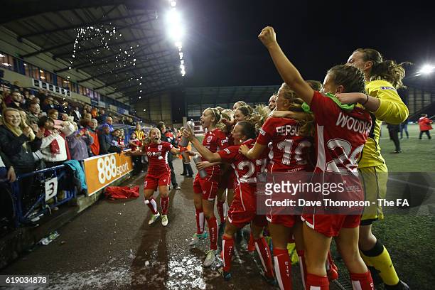 Bristol City Women celebrate securing promotion after beating Everton Ladies during the WSL 2 match between Everton Ladies and Bristol City Women at...