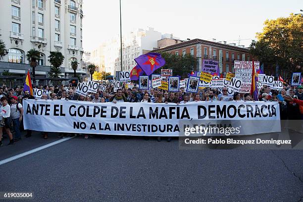 Demonstrators shout slogans and hold a banner reading 'Against the mob coup, democracy. Not to the Illegitimate investiture' as the investiture...