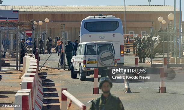 Algeria - A bus carrying reporters enter an accommodation area at a gas facility in In Amenas, eastern Algeria, on Jan. 31 as the Algerian government...