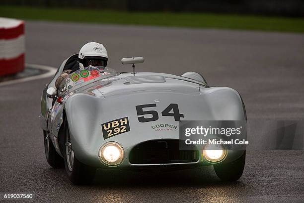 Cooper-Jaguar T33 entered and driven by Derek Hood, on the chicane, in the wet, during the Freddie March Memorial Trophy race at Goodwood on...