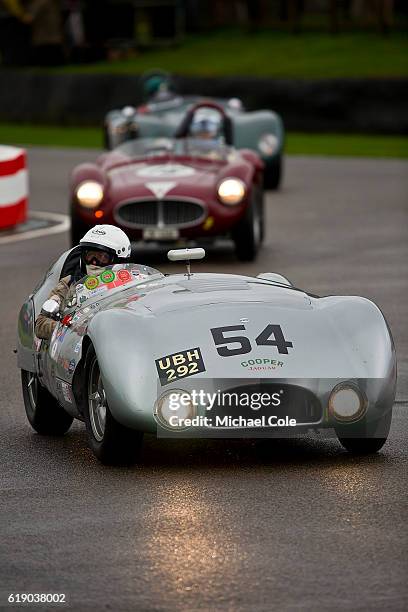 Cooper-Jaguar T33 entered and driven by Derek Hood, on the chicane, in the wet, during the Freddie March Memorial Trophy race at Goodwood on...