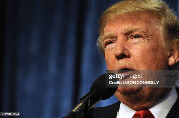 Republican Presidential nominee Donald Trump addresses supporters during a campaign rally at the Jefferson County Fairgrounds - Rodeo Arena & Event...